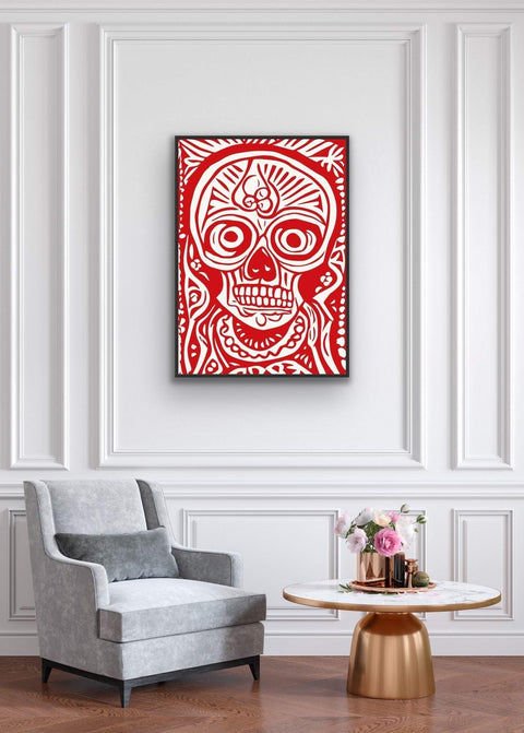 Framed poster featuring a vibrant red and white skull design, perfect for adding character to wall decor.