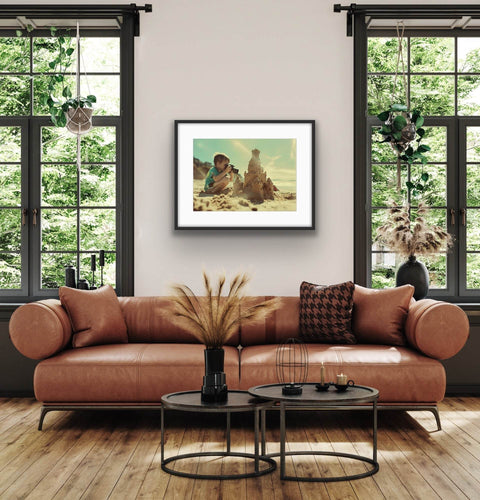 Framed poster featuring a vintage image of a kid at the beach, enhancing wall decor with vibrant colors.