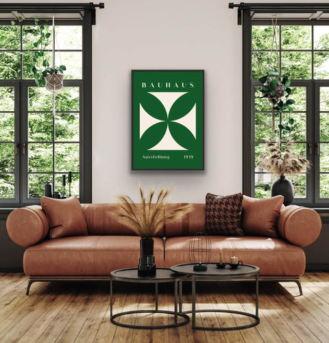 Framed poster featuring Bauhaus art with bold geometric design in modern home setting.