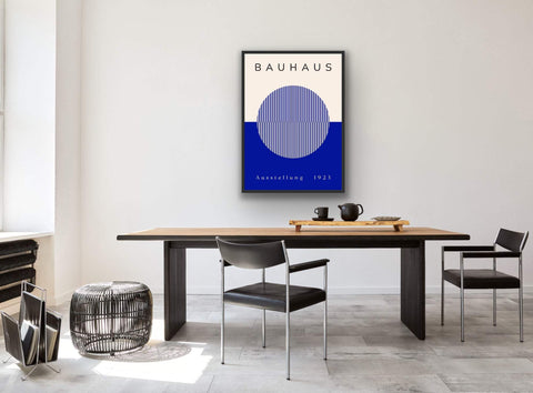 Framed poster with Bauhaus-inspired geometric design in bold colors for modern home decor.