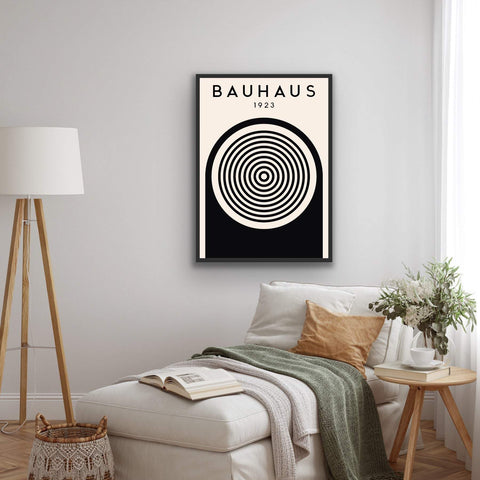 Framed poster of modern Bauhaus-inspired geometric art print with black and white shapes.