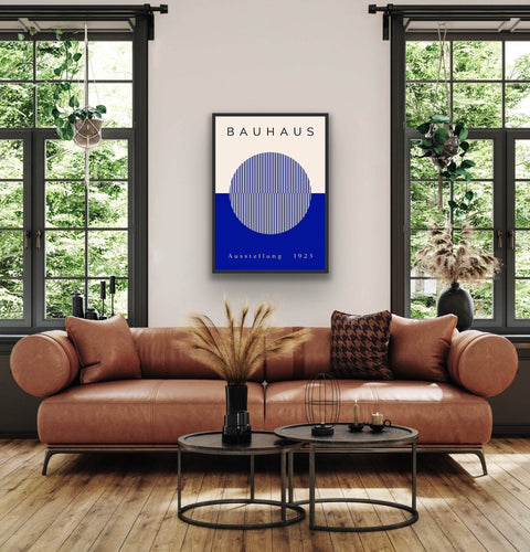 Framed poster with Bauhaus-inspired design, featuring bold colors and geometric shapes, enhancing modern home decor.