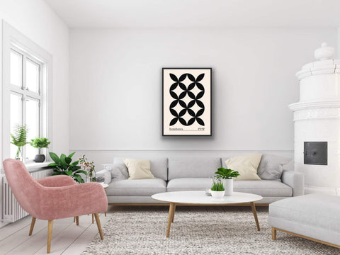 Framed poster featuring Bauhaus-inspired geometric art in black and cream, enhancing modern decor.