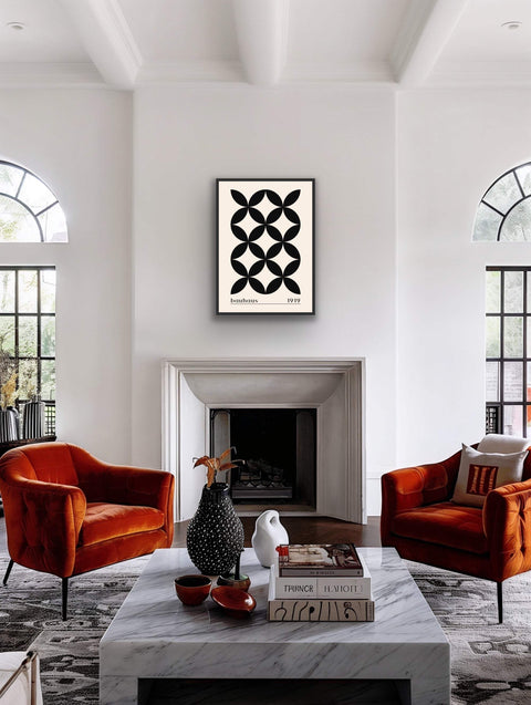 Framed poster with Bauhaus-inspired geometric black and cream design in a modern room.
