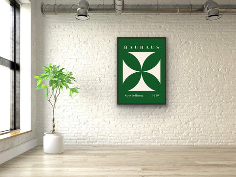 Framed poster featuring Bauhaus geometric design in green and white, enhancing modern home decor.