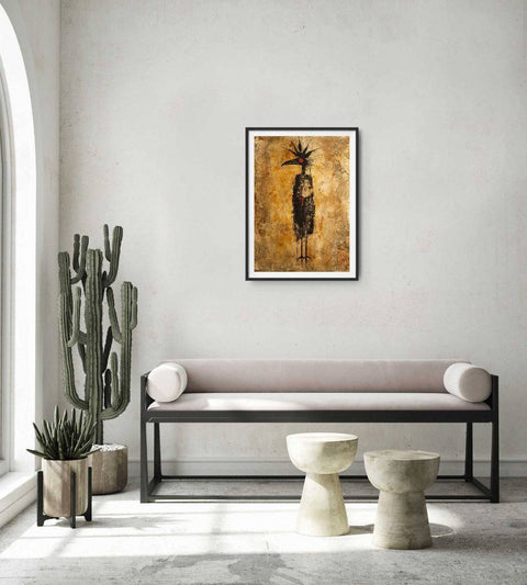 Framed poster with abstract figure on textured background hanging in modern living space.