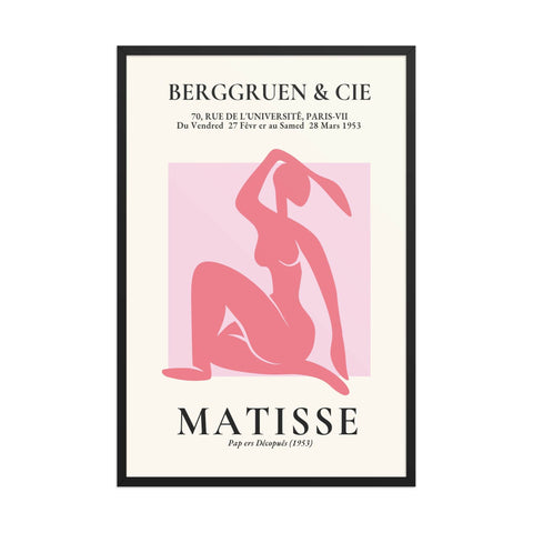 a bottle of wine with a woman sitting on it