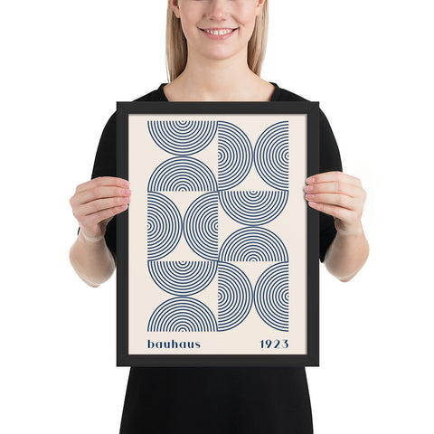 Framed poster featuring Bauhaus geometric design with minimalist color palette.