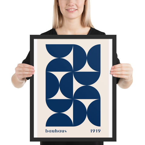 Framed poster with geometric Bauhaus-style navy blue art print.