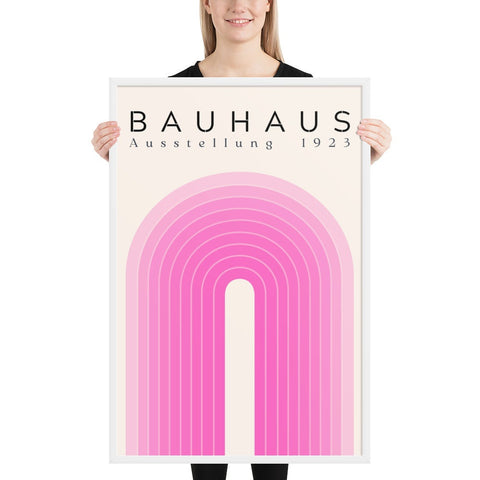 Framed poster featuring a vibrant pink Bauhaus design, adding modern sophistication to any space.