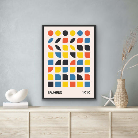 Framed poster with Bauhaus-inspired geometric design and bold primary colors.