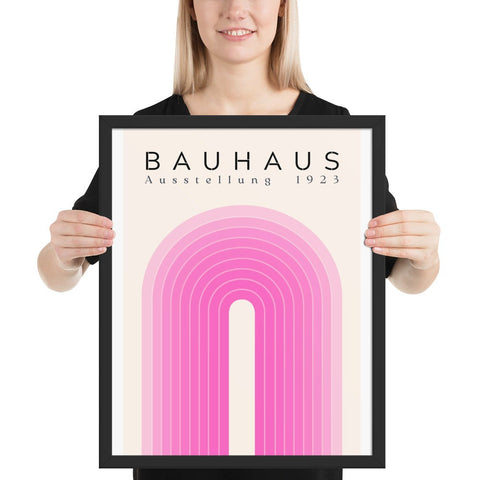 Framed poster with vibrant Bauhaus design, perfect for modern home decor.