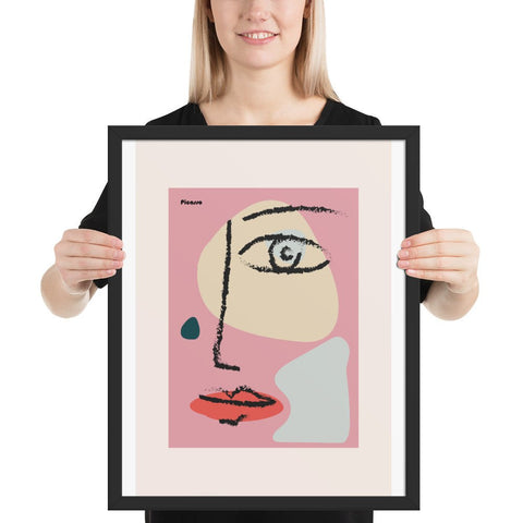 Framed poster with abstract face design and bold lines, perfect for modern home decor.