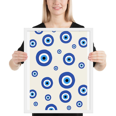 Framed poster with blue and white circle pattern adds modern elegance to home decor.