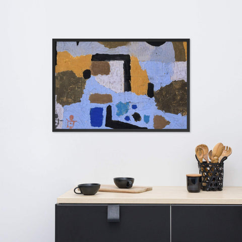 Framed photo paper poster with abstract design in black frame hanging above a modern cabinet.
